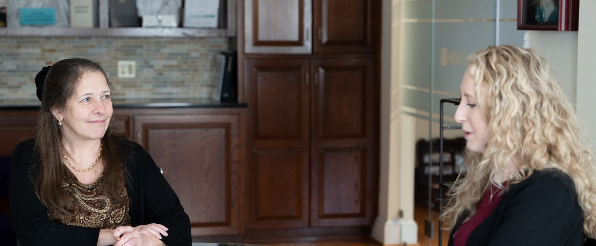 Sara Kate & Robyn in conf room