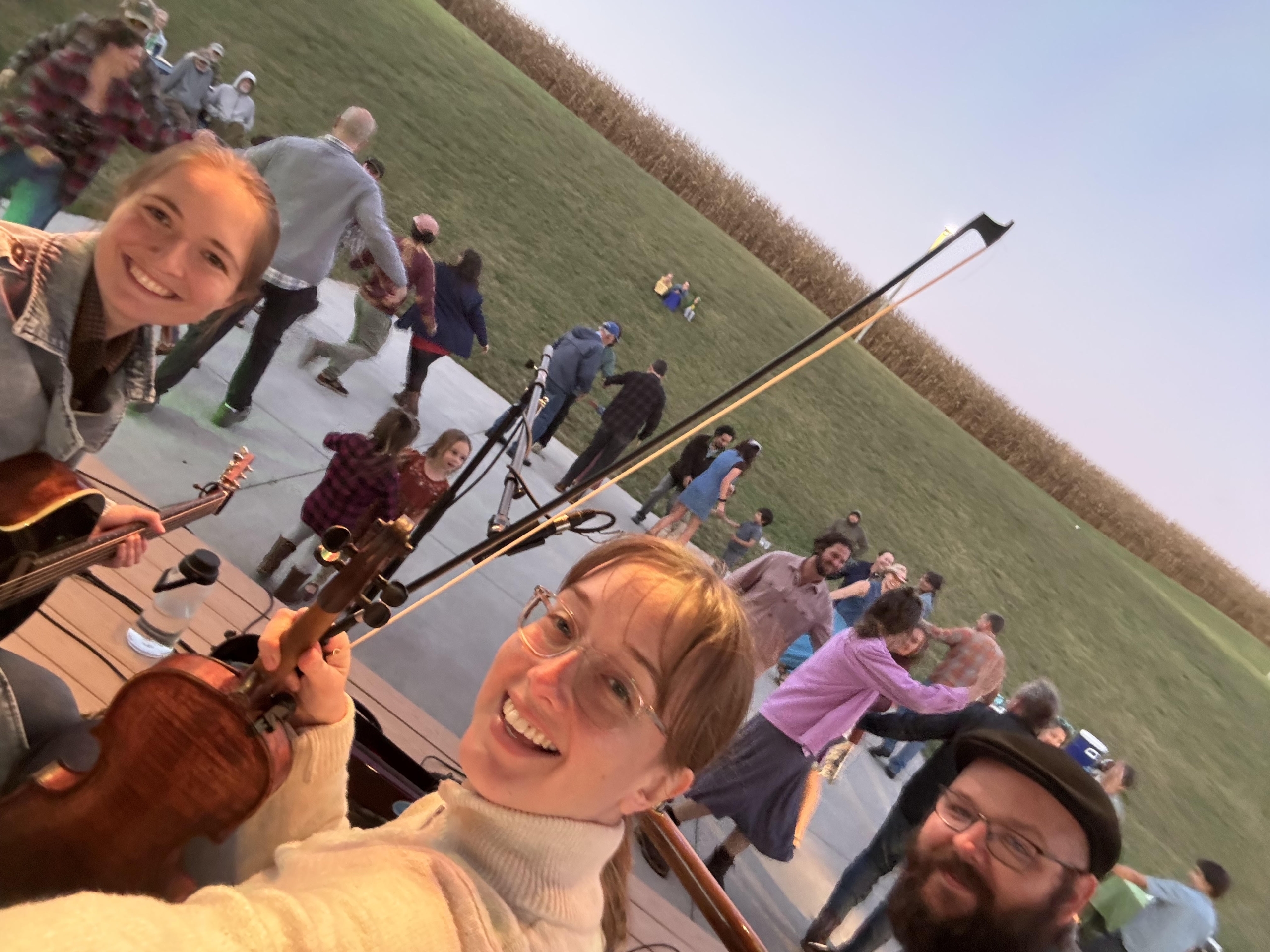 K 3 Kaley with her fiddle on a stage