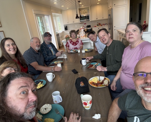 RH 1 Group of people gathered at a dinner table
